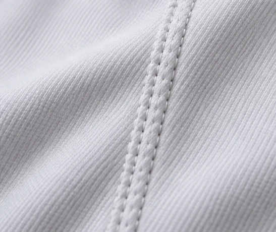 Close-up of baseball apparel fabric and garment construction